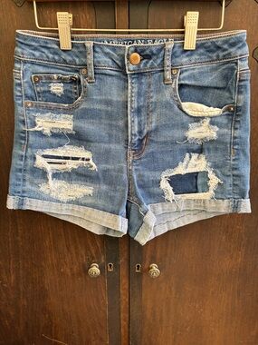 American Eagle Outfitters Distressed SHRS Light Blue Denim Jean Shorts Sz 4